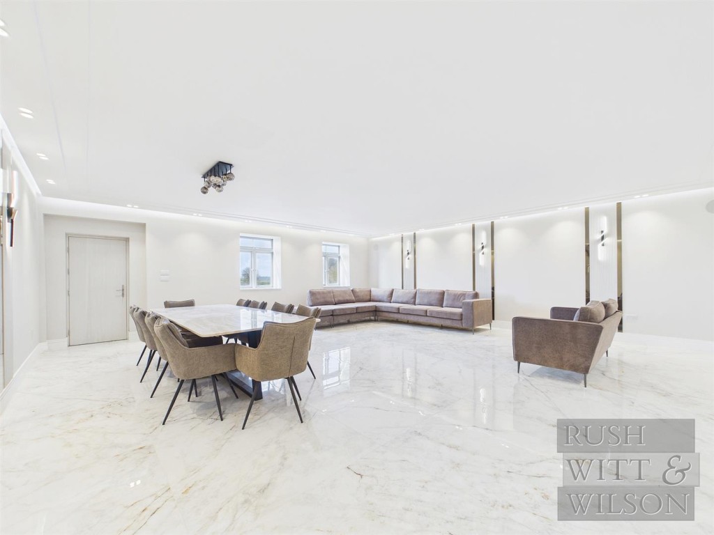 Lot: 100 - WELL PRESENTED DETACHED HOUSE - Living and dining room in another angle 3